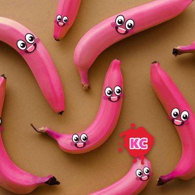 Round pink banana sticker with smiling faces – design 2