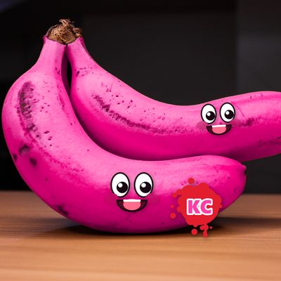 Round pink banana sticker with smiling faces – design 3